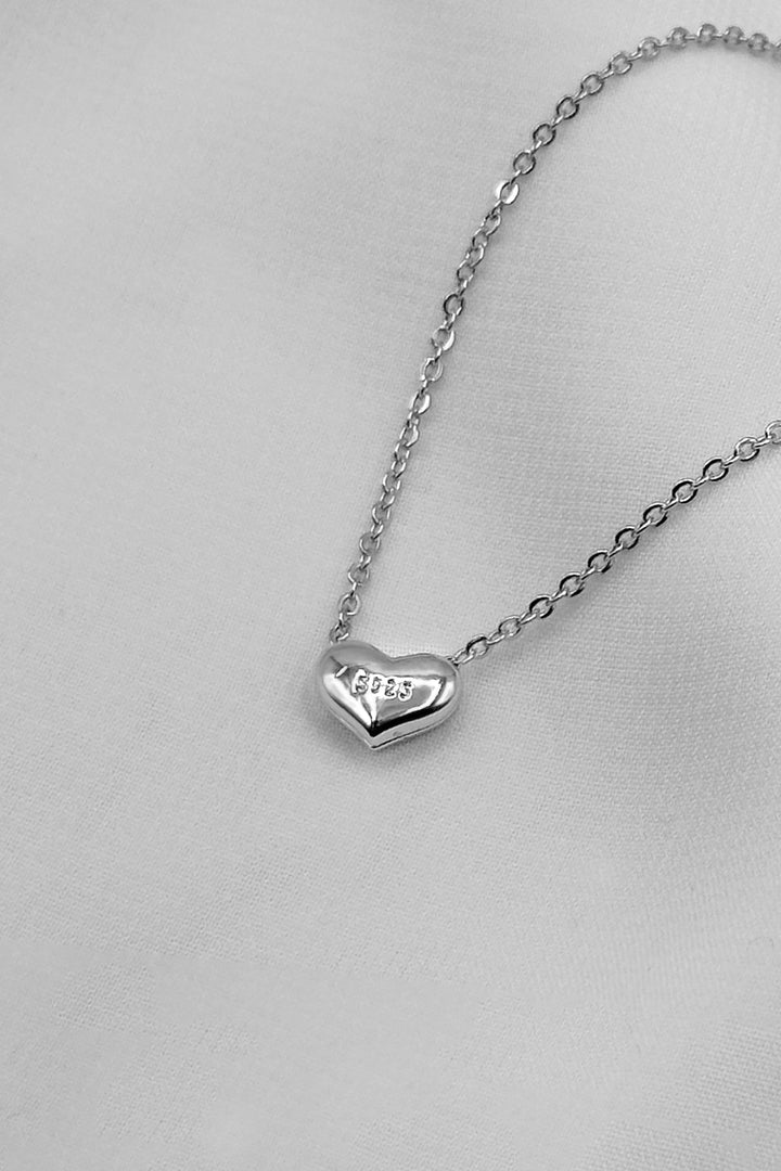 Tiny Heart Necklace In Silver