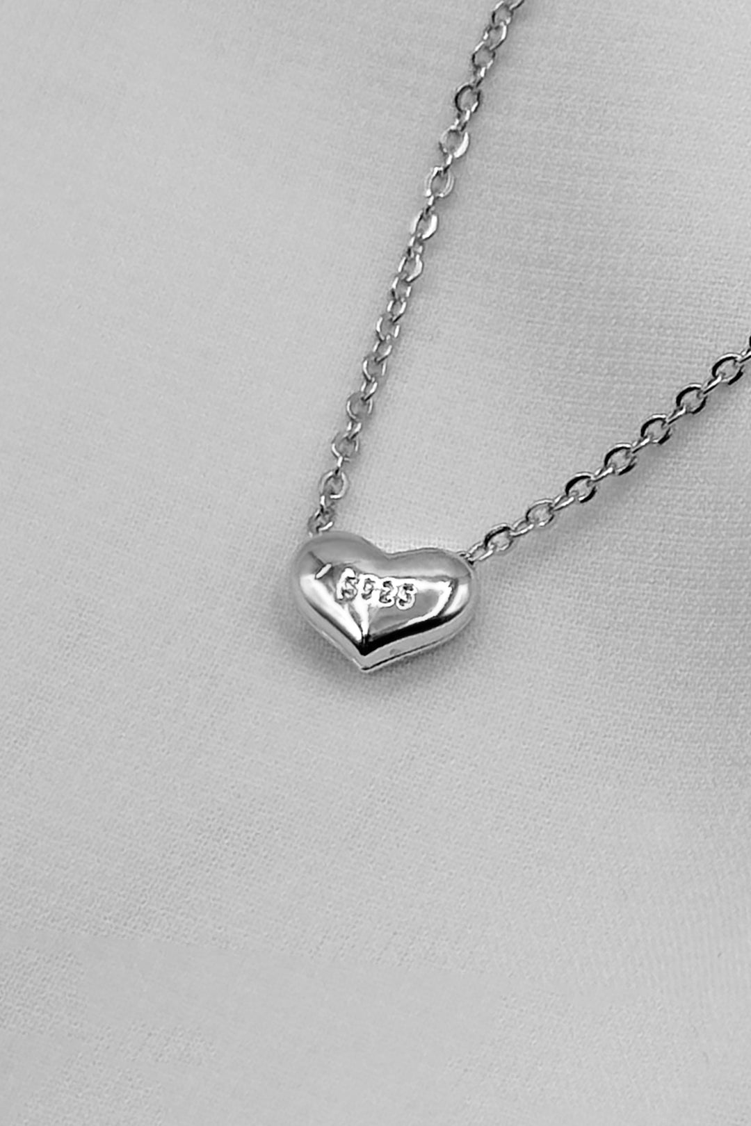 Tiny Heart Necklace In Silver