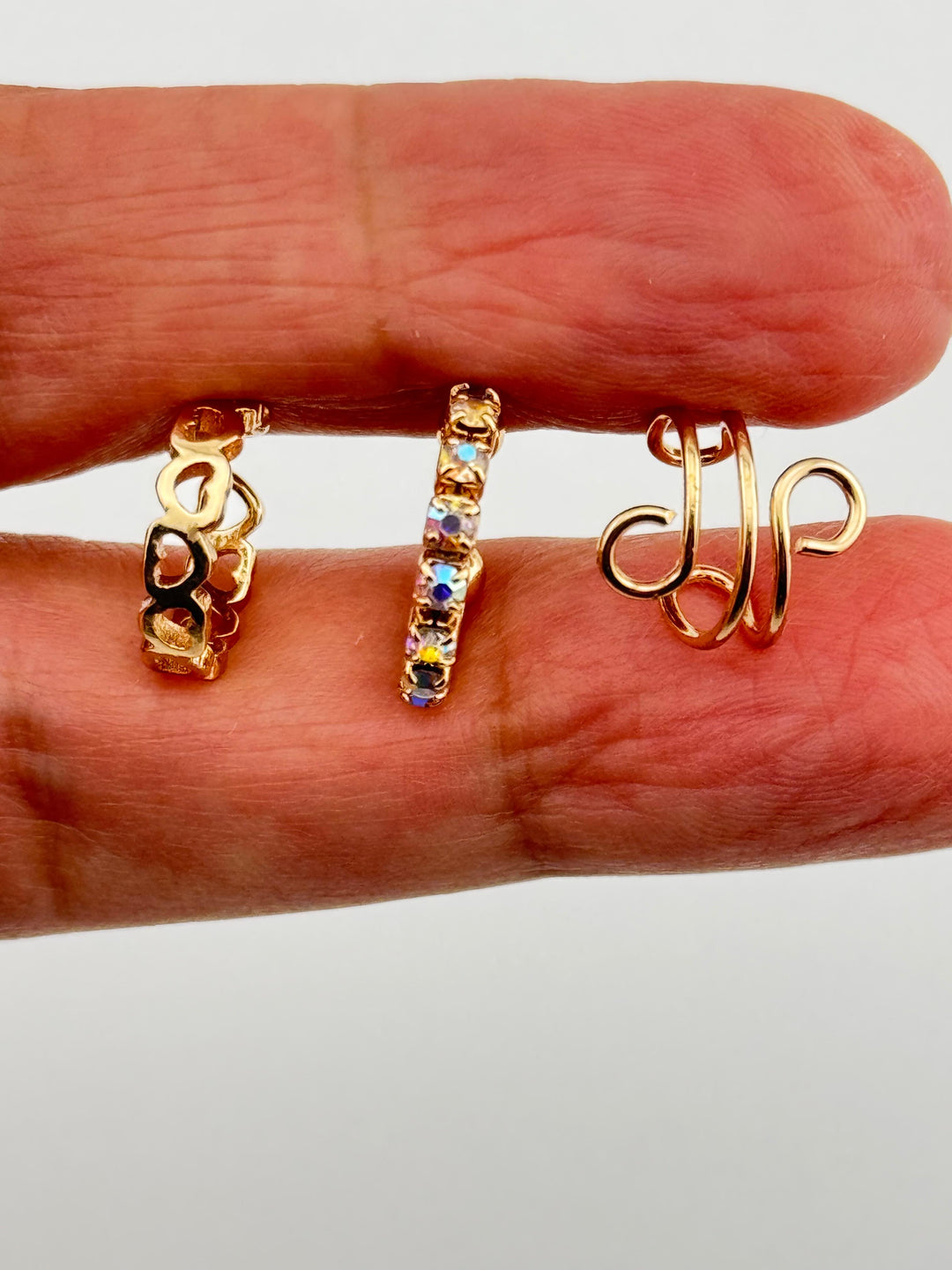 3-Piece Gold-Tone Ring Set, Mixed Styles, Open hoop, Crystal-lined, and twisted