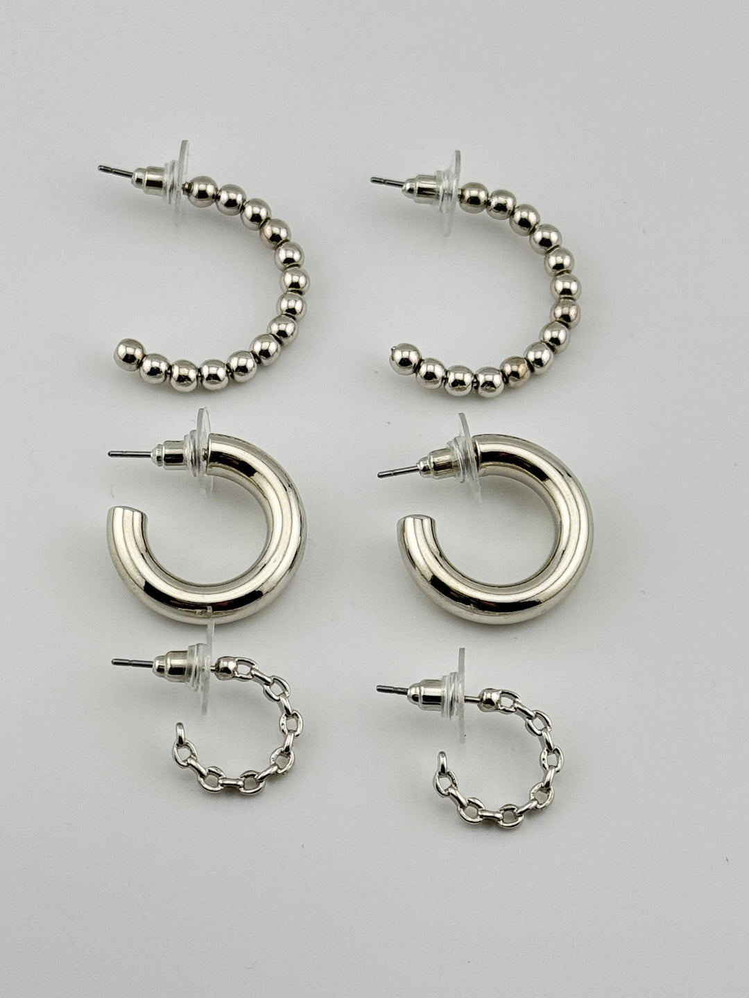 3-Piece Gold-Tone Hoop Earrings Set with Chain Detail, 3 pairs of hoop earrings with different styles (chain, thick, and beaded)