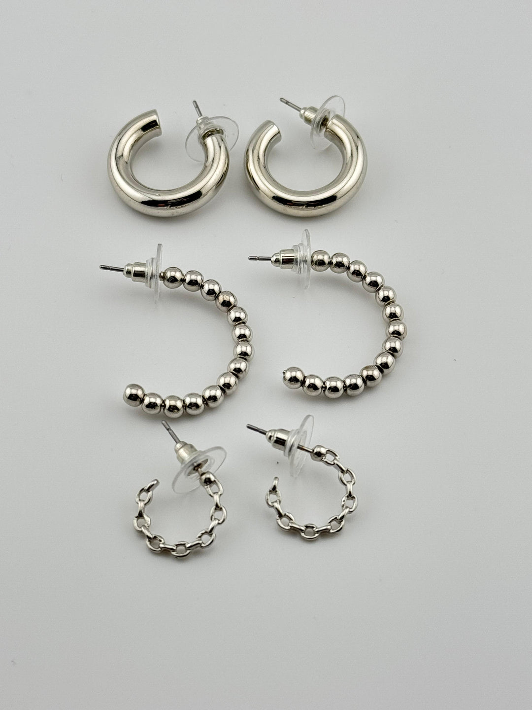 3-Piece Gold-Tone Hoop Earrings Set with Chain Detail, 3 pairs of hoop earrings with different styles (chain, thick, and beaded)