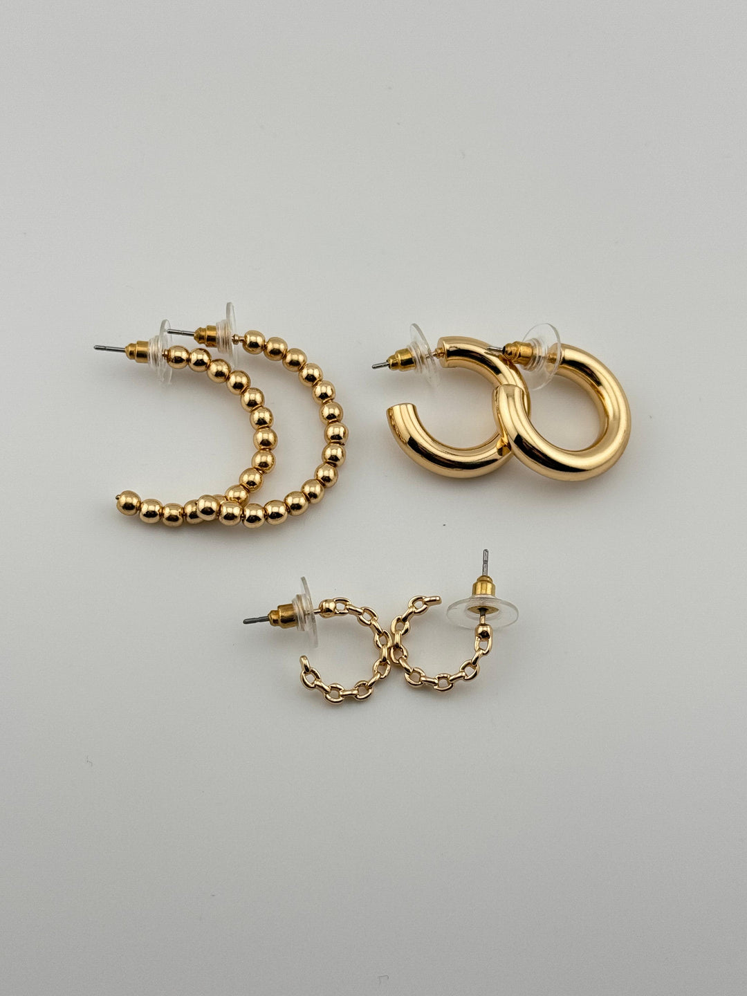 3-Piece Gold-Tone Hoop Earrings Set with Chain Detail, 3 pairs of hoop earrings with different styles (chain, thick, and beaded)