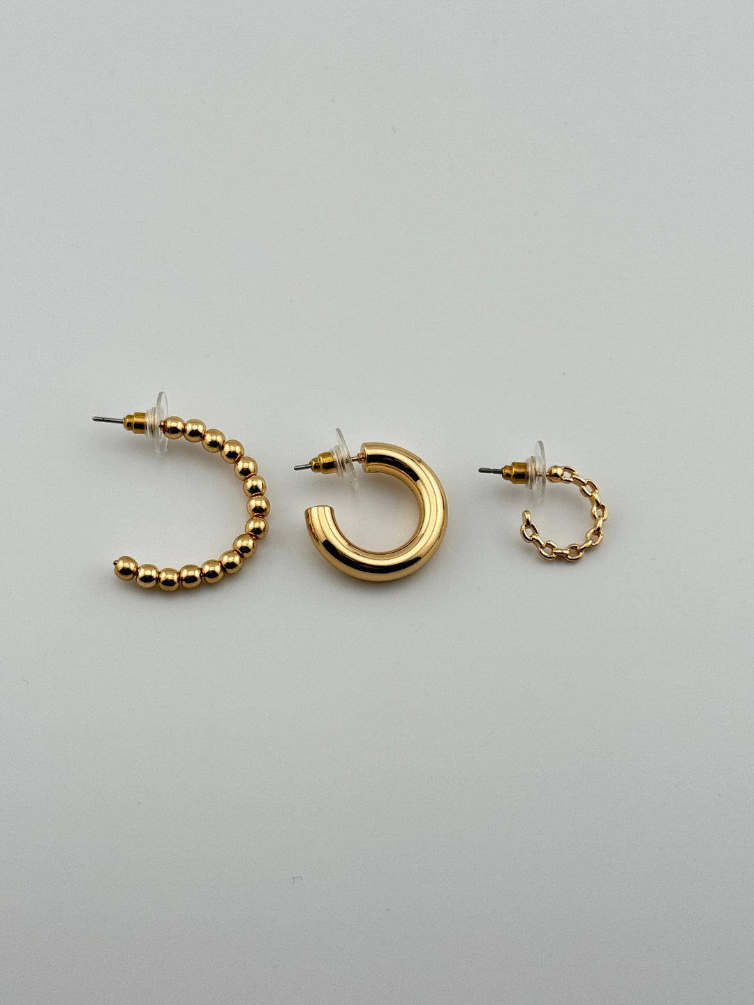 3-Piece Gold-Tone Hoop Earrings Set with Chain Detail, 3 pairs of hoop earrings with different styles (chain, thick, and beaded)